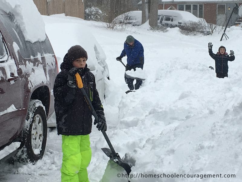 Snow Day. Kids Shoveling Snow for Fun.