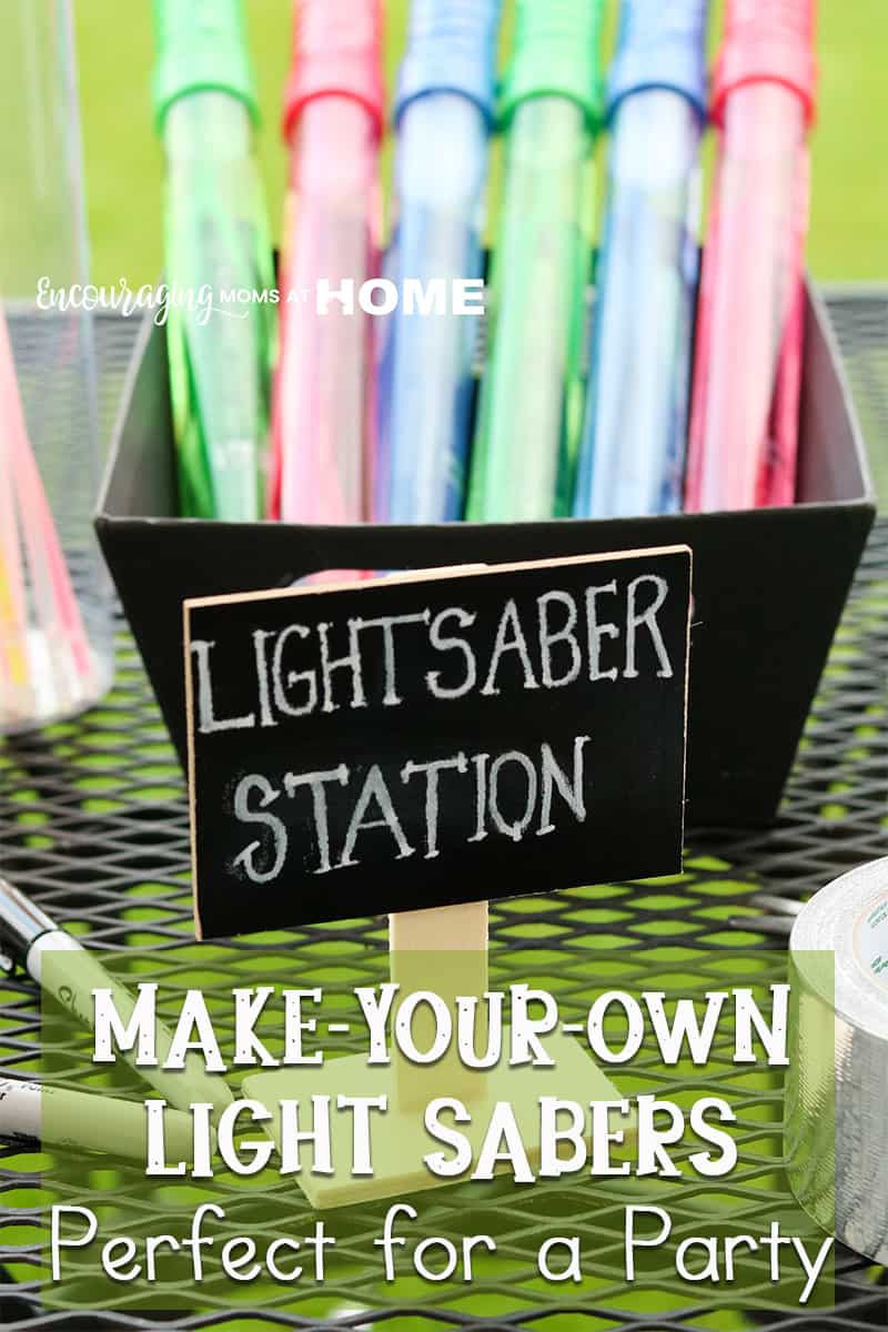 Star Wars Party Ideas - Kids Light Sabers supplies and instructions displayed on a table at your next SW event.