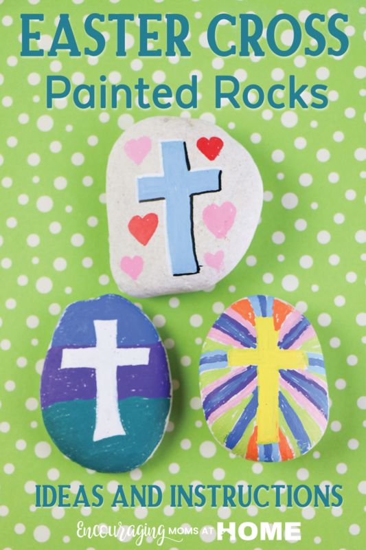 Three rocks decorated with cross images for Easter.