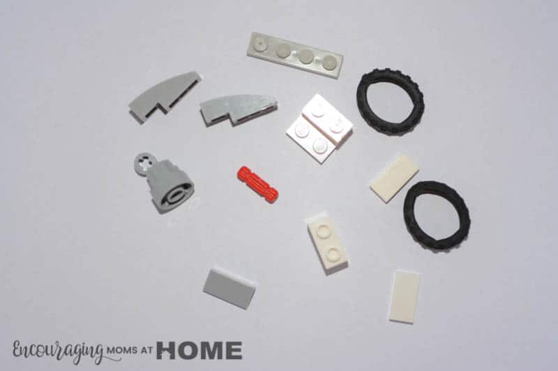 Red, White and Grey Lego pieces are arranged for quick identification.