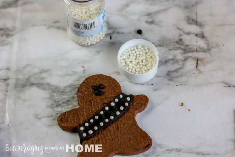 Decorating the Star Wars inspired Wookie Cookies.