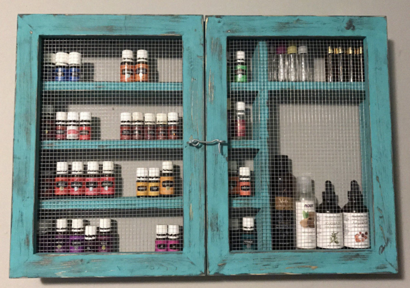 Beautiful essential oil cabinet to keep all of your RMO and Young Living and DoTerra oils safely tucked away. 